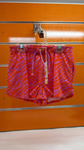 Short niña Losan animal print naranja y lila — fotografía del producto