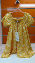 Vestido bebé Losan amarillo de flores — fotografía del producto