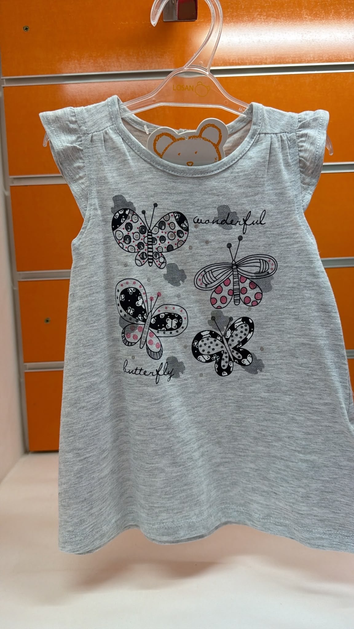 Vestido bebé niña Losan gris con mariposas — fotografía del producto