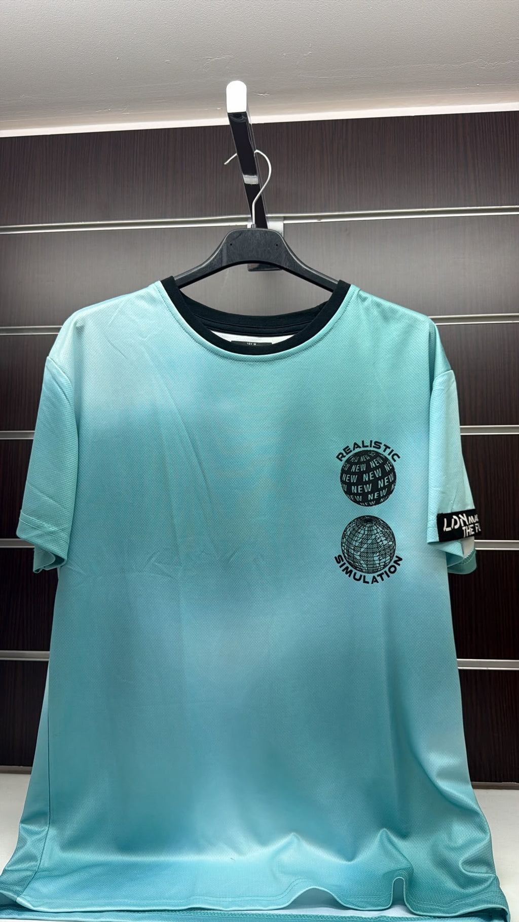 Camiseta técnica niño Losan negra Digital Waves — fotografía del producto
