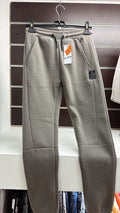 Pantalón deportivo juvenil gris con detalle Creative Team — fotografía del producto