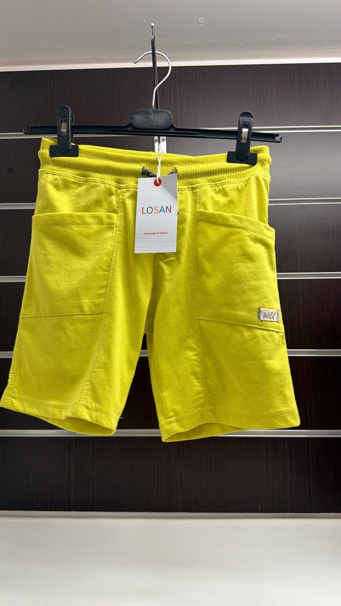 Bermuda niño Losan amarillo con bolsillos — fotografía del producto