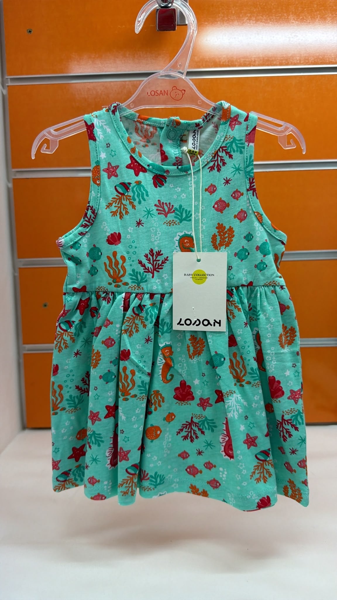 Vestido bebé Losan verde agua estampado marino — fotografía del producto