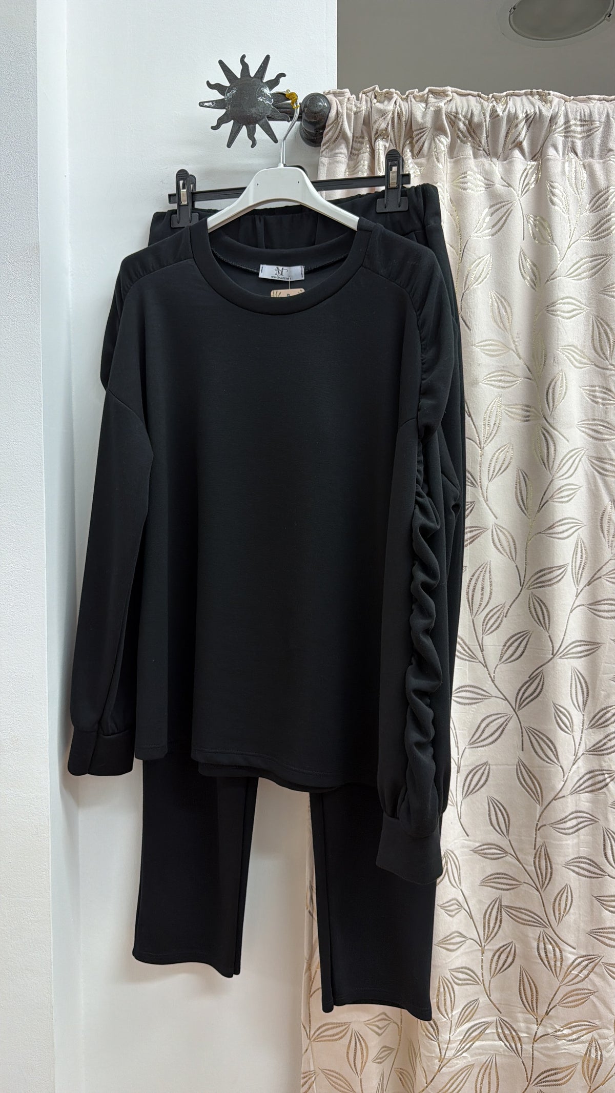 Conjunto deportivo negro — fotografía del producto