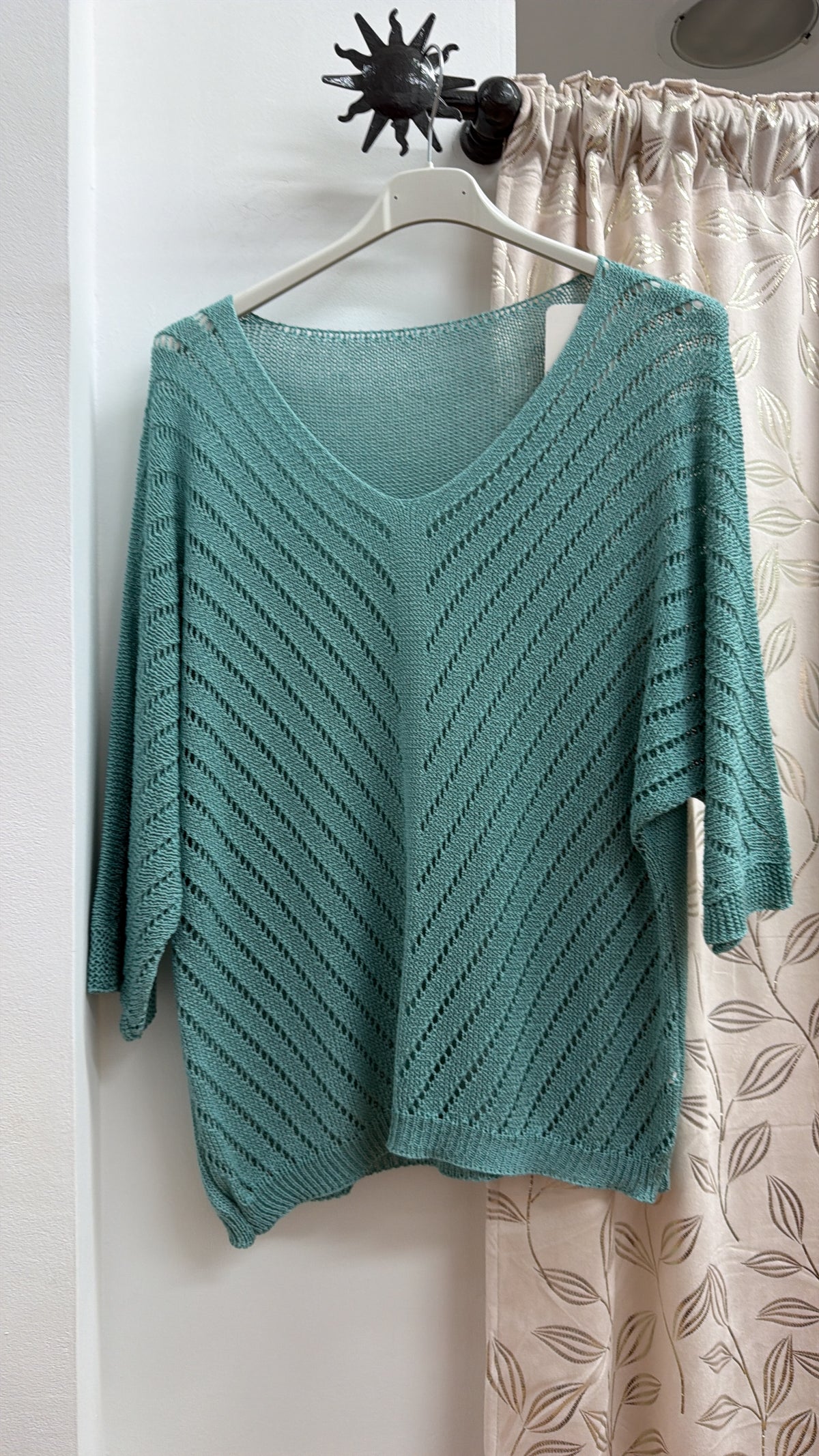Jersey calado verde agua — fotografía del producto