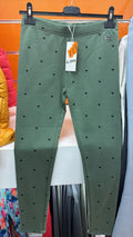 Leggings largos verdes con corazones para niña — fotografía del producto