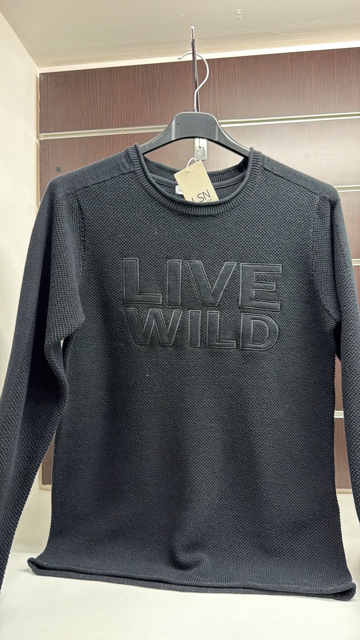 Jersey juvenil negro Live Wild — fotografía del producto