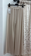 Pantalón palazzo punto beige — fotografía del producto