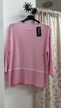 Jersey rosa con detalles en contraste — fotografía del producto