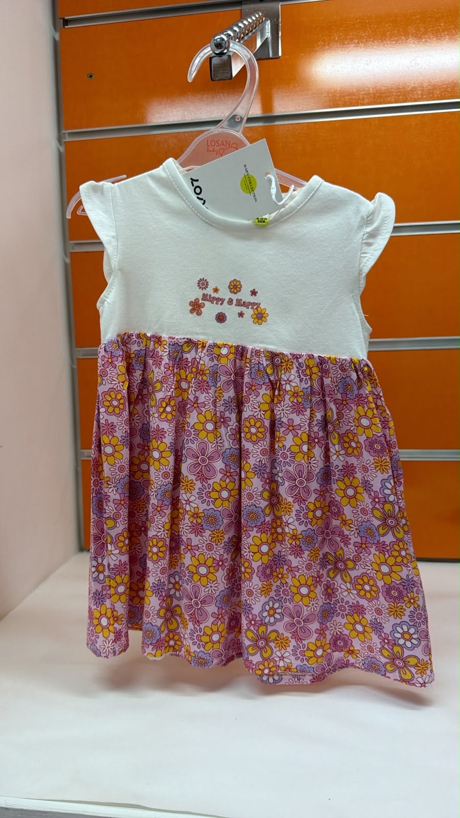 Vestido bebé Losan floral rosa y amarillo — fotografía del producto