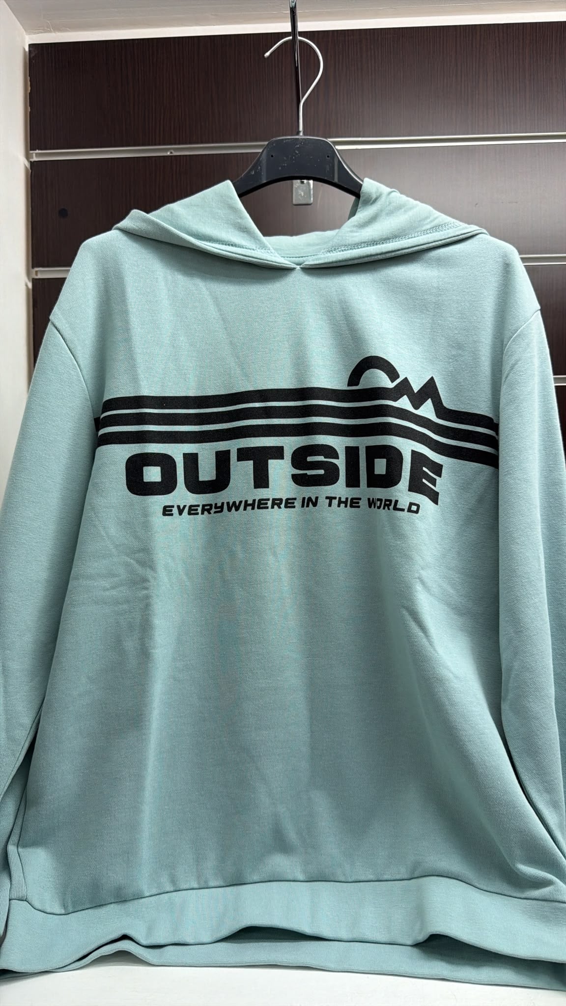 Sudadera juvenil verde agua con capucha Outside — fotografía del producto