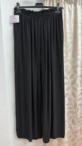 Pantalón palazzo negro texturizado — fotografía del producto