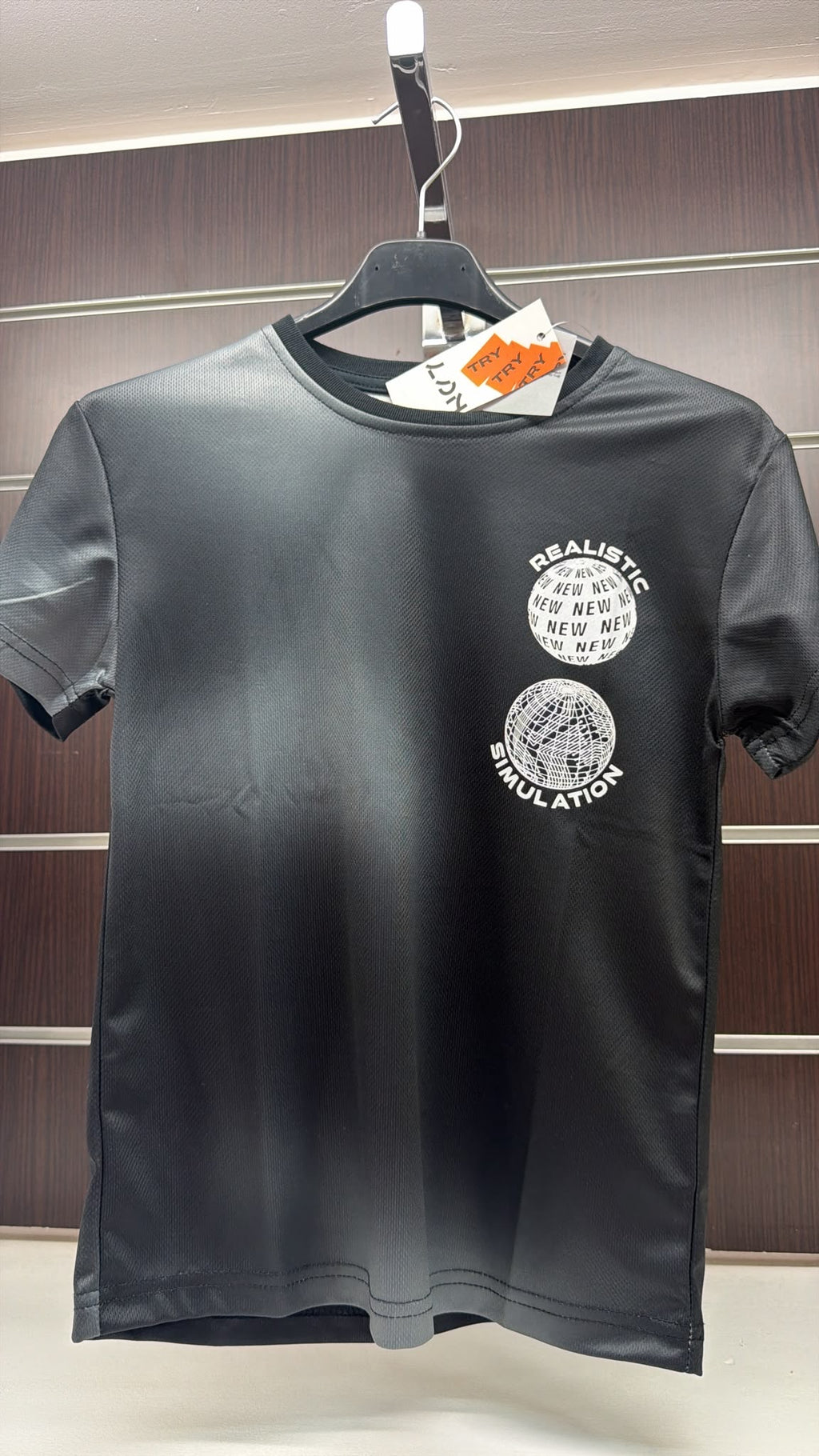 Camiseta técnica niño Losan negra Digital Waves — fotografía del producto