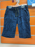 Bermuda infantil Losan azul estampado urbano — fotografía del producto