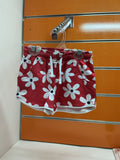 Short niña rojo con flores blancas — fotografía del producto