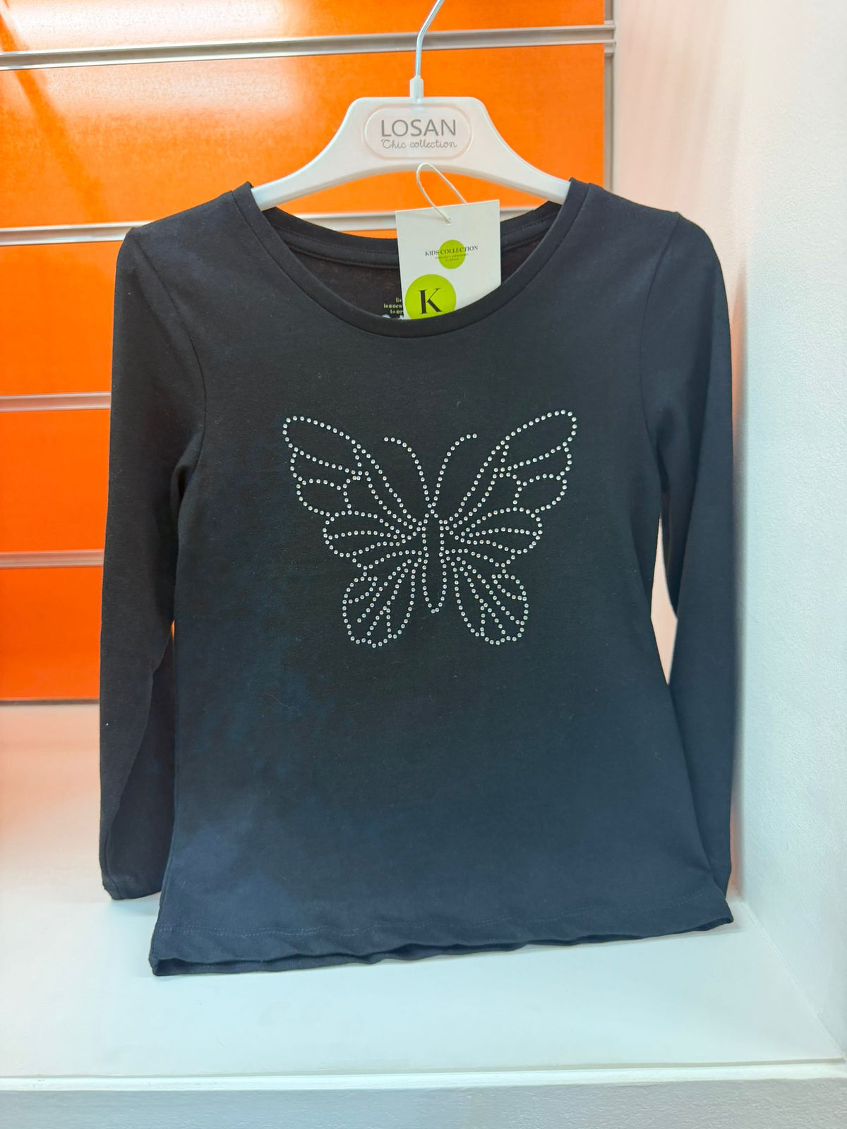 Camiseta niña Losan negra de manga larga con mariposa de strass