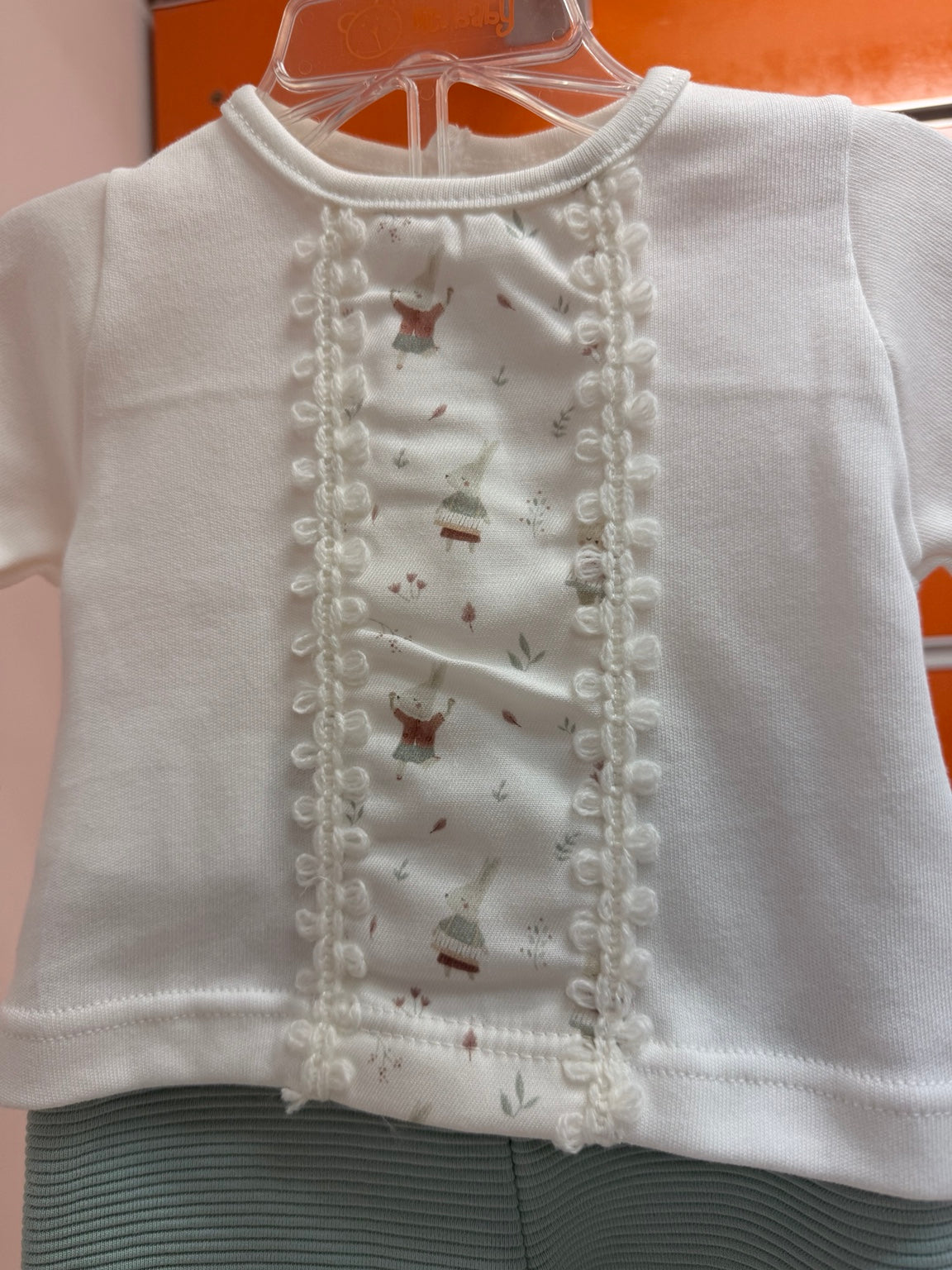 Detalle del conjunto bebé Calamaro Arosa blanco y verde agua
