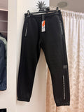 Pantalón jogger Losan negro con bolsillos de cremallera talla 12/XS