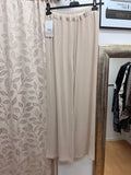 Pantalón de mujer color crema de punto con pierna ancha