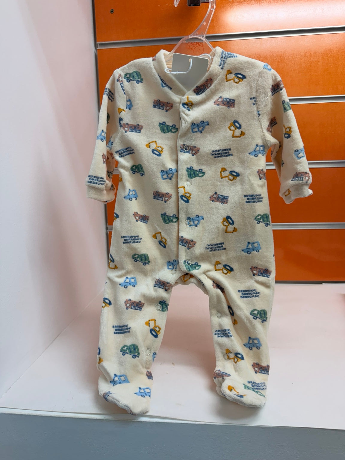 Pelele bebé Water Lemon crema con estampado de vehículos