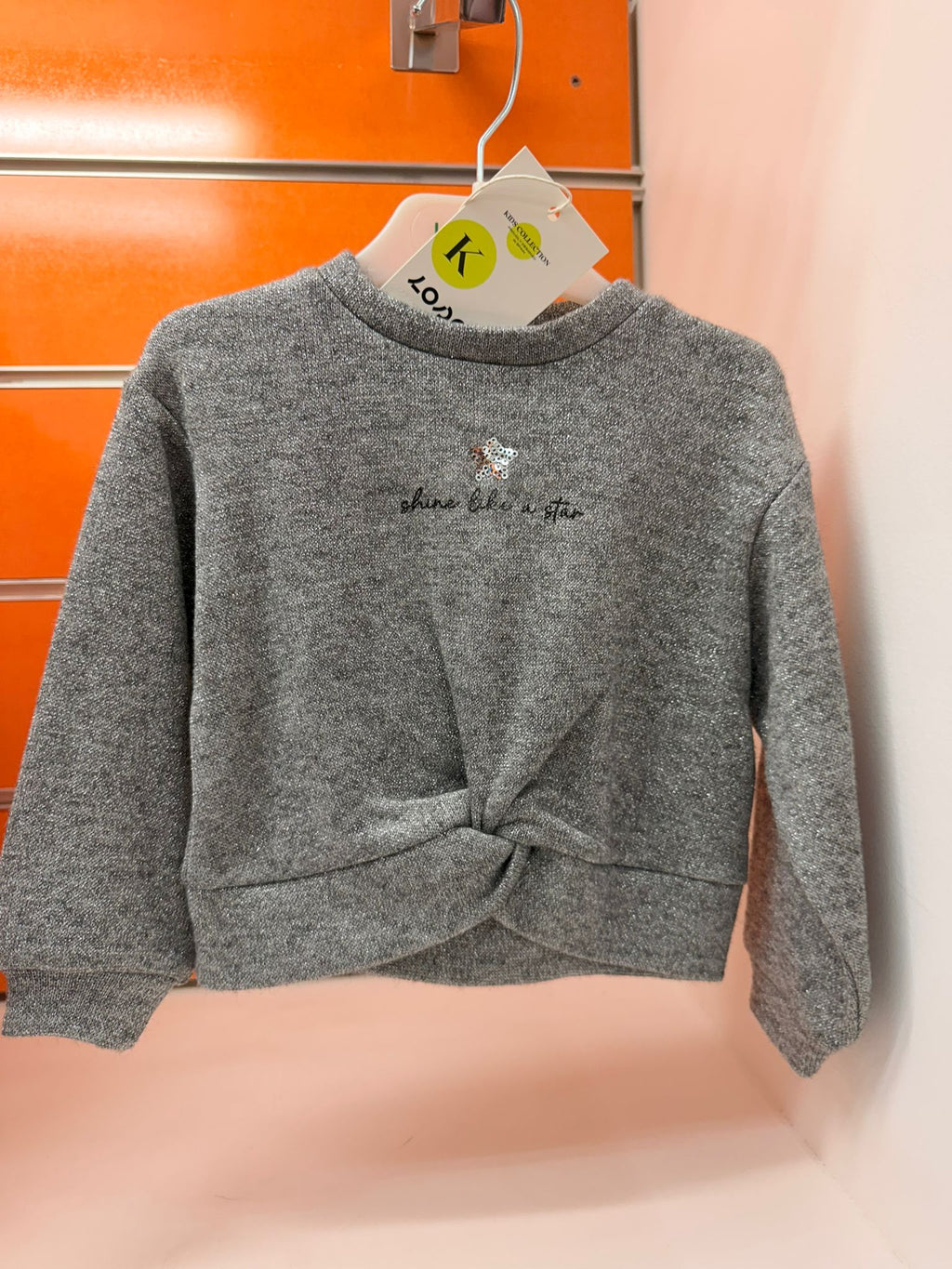 Sudadera niña Losan gris con brillo, nudo delantero y estrella, talla 2 años