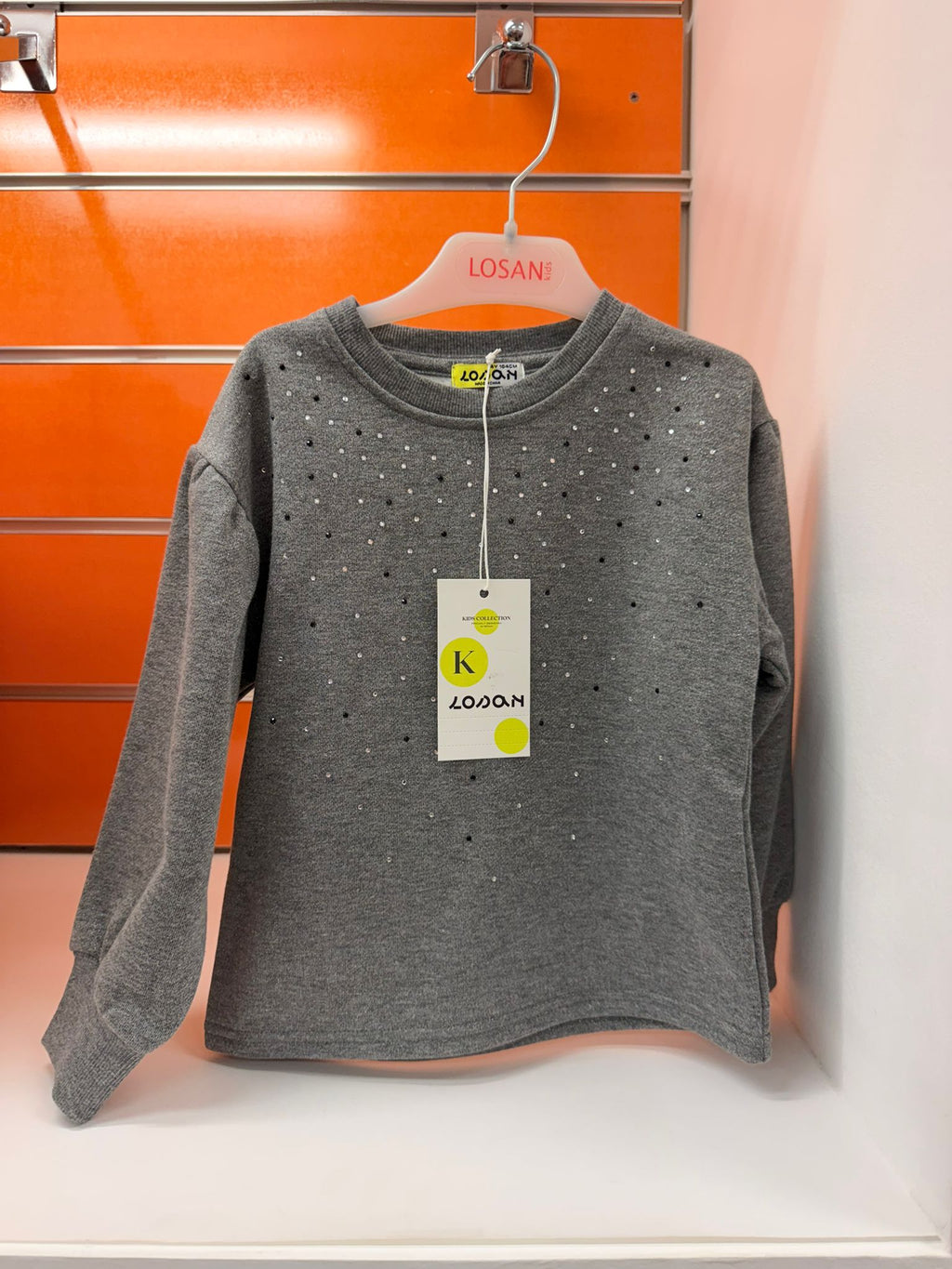 Sudadera niña Losan gris con aplicaciones brillantes, talla 4 años