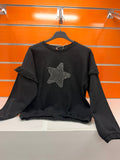 Sudadera de niña Losan negra con estrella frontal de aplicaciones tipo perla y volantes