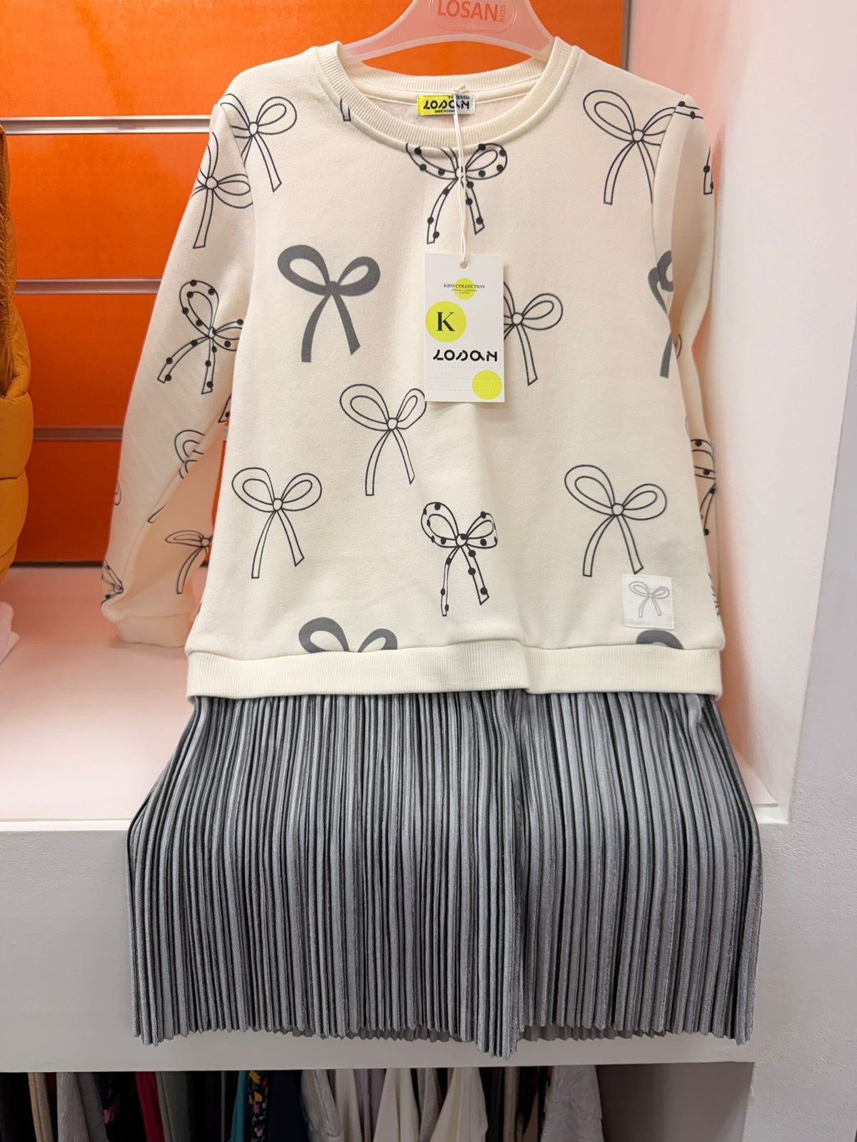 Vestido niña Losan crudo con lazos y falda plisada gris, talla 7 años